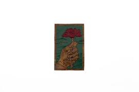 Repujado en cobre mano con flor
