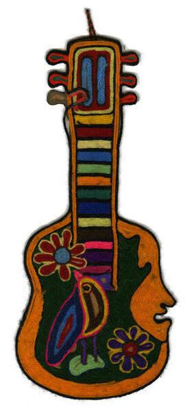 Lanigrafía con forma de guitarra